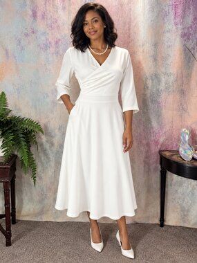 New📌 Bbonlinedress  Great For Many Occasions White Surplice Midi Dress